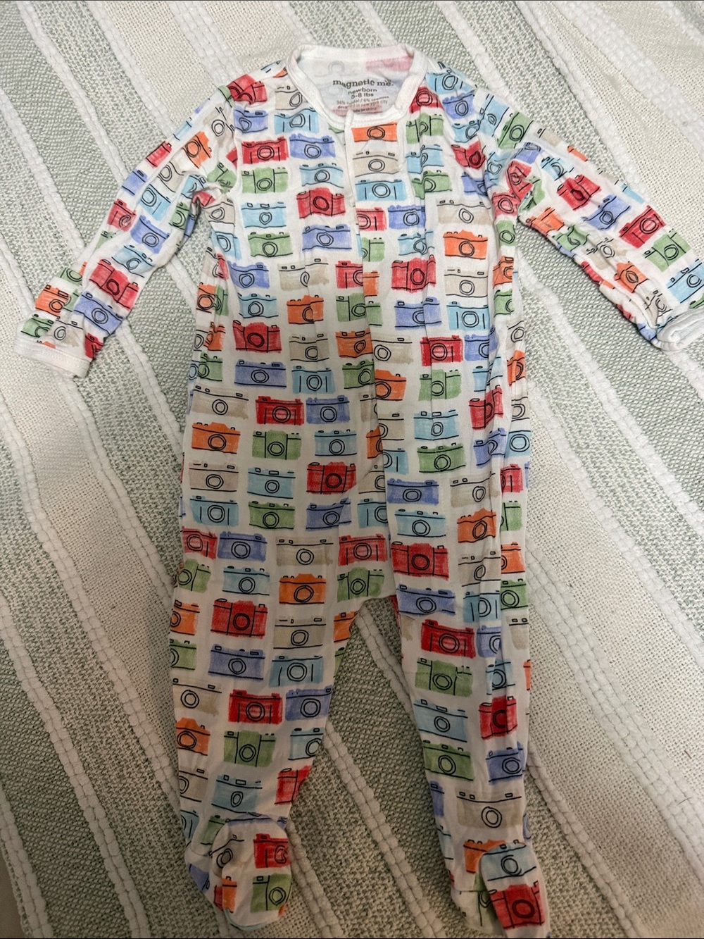 Magnetic Me White Footed One-Piece with Colorful Camera Print